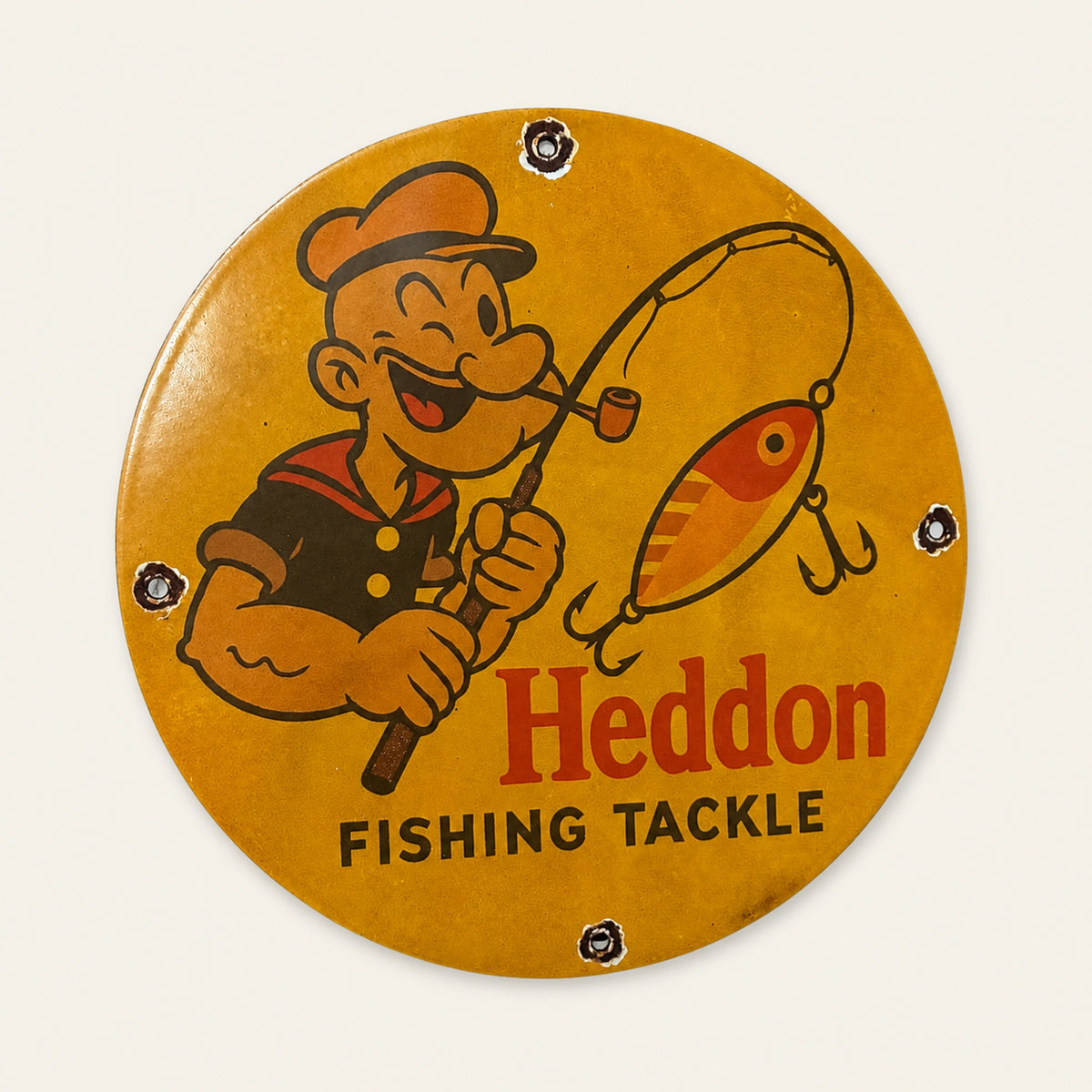 Round Heddon Fishing Tackle enamel sign, front view