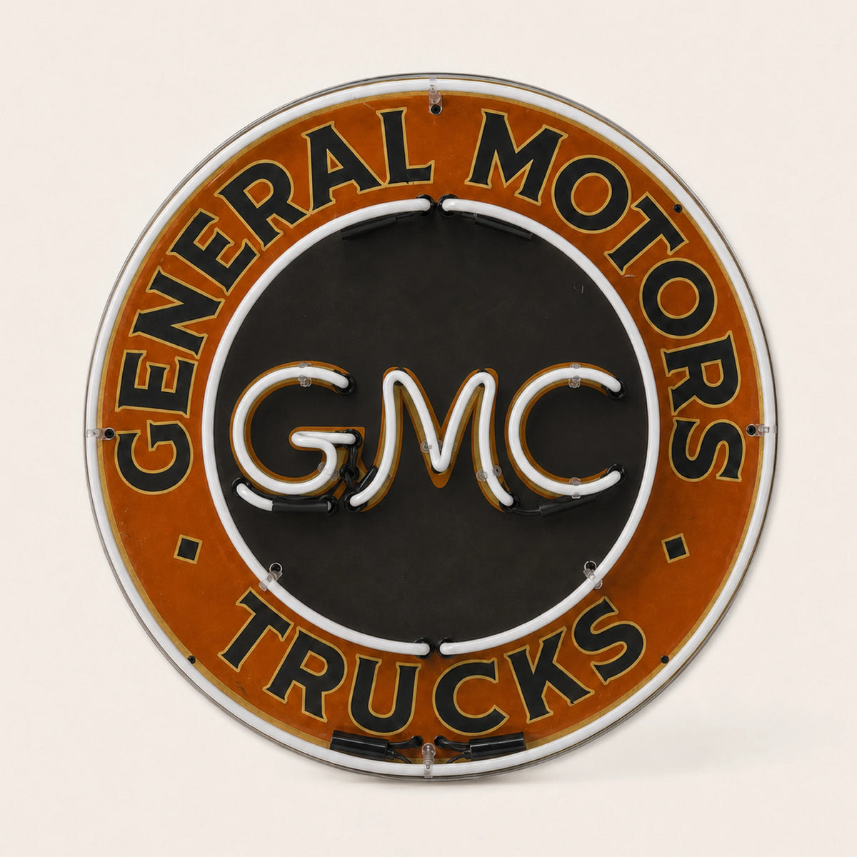 Round 60 cm General Motors Trucks GMC enamel neon sign with lights off, front view